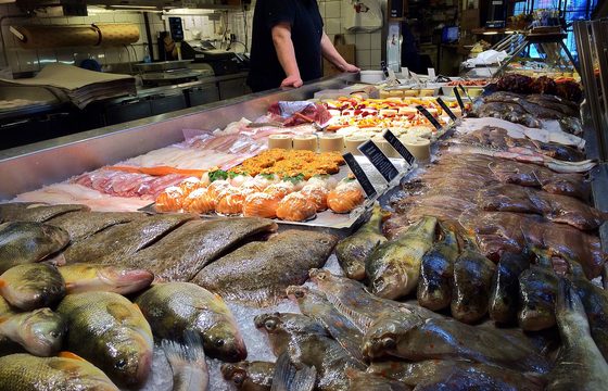 A fish and seafood counter in a Stockholm market hall