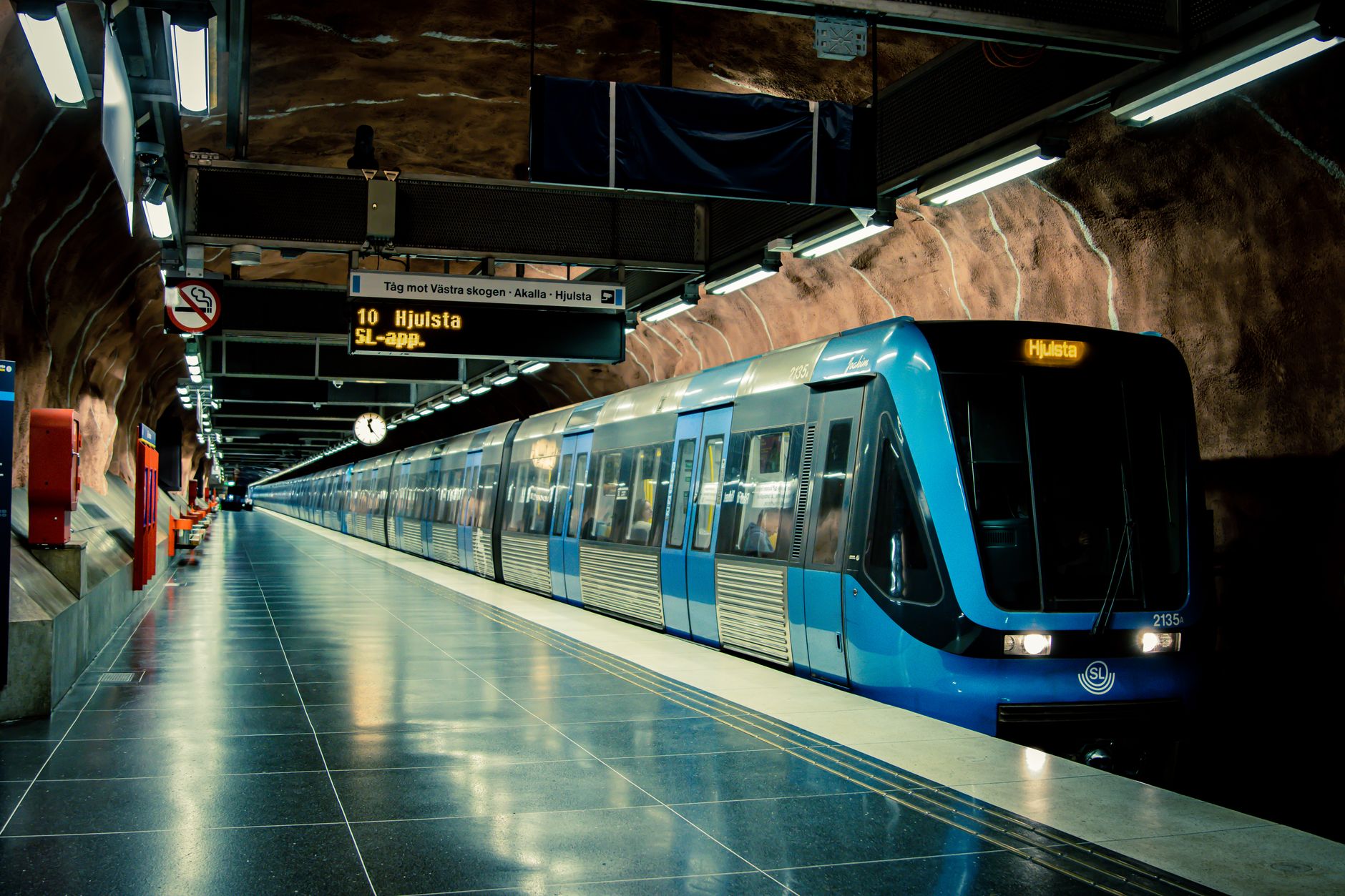 Stockholm metro train at Hjulsta station, Sweden, featuring modern design and underground architecture.