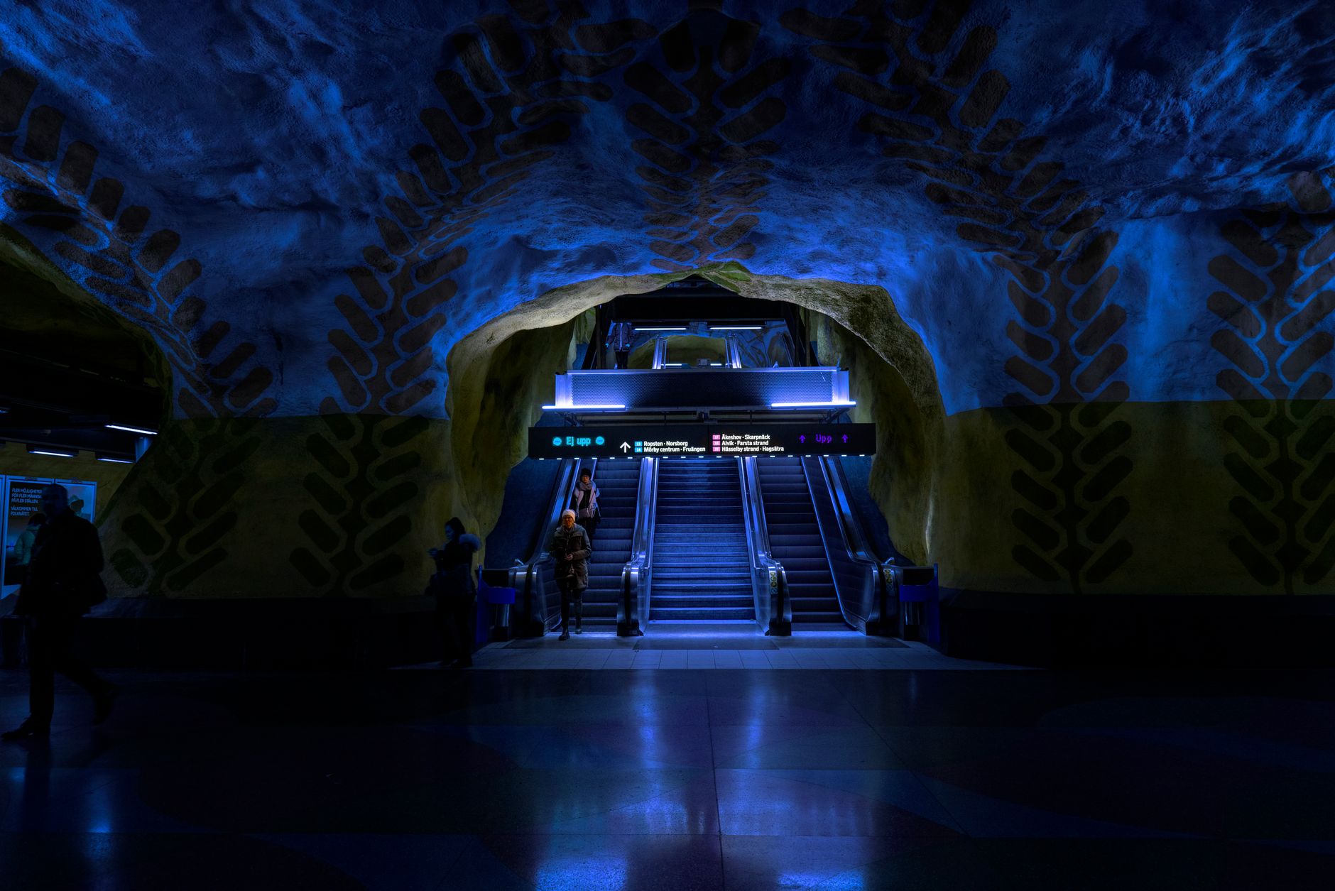Explore the iconic blue-themed artwork and architecture of T-Centralen Metro Station in Stockholm, Sweden. — illustrating How Do Stockholm’s Commuter Ferries Actually Work?
