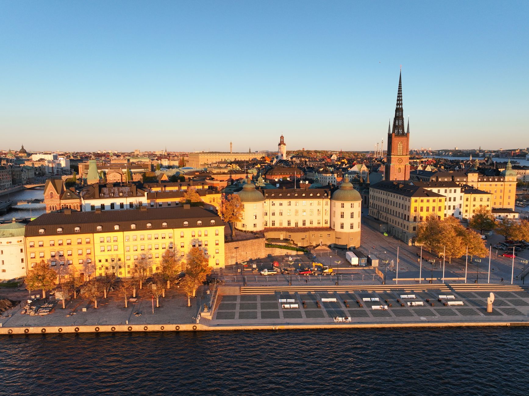 Aerial view of Stockholm's historic architecture bathed in sunset light
