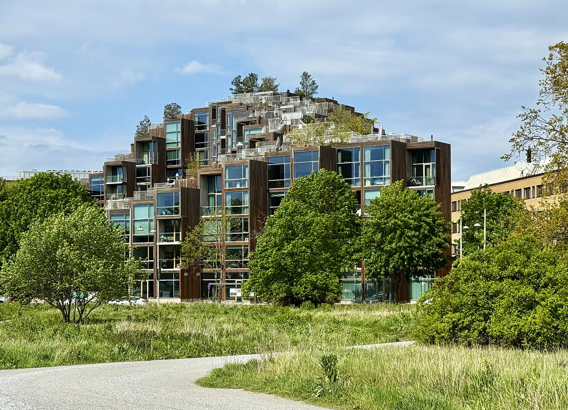 The residential building 79&Park in Gärdet, Stockholm, seen from the park