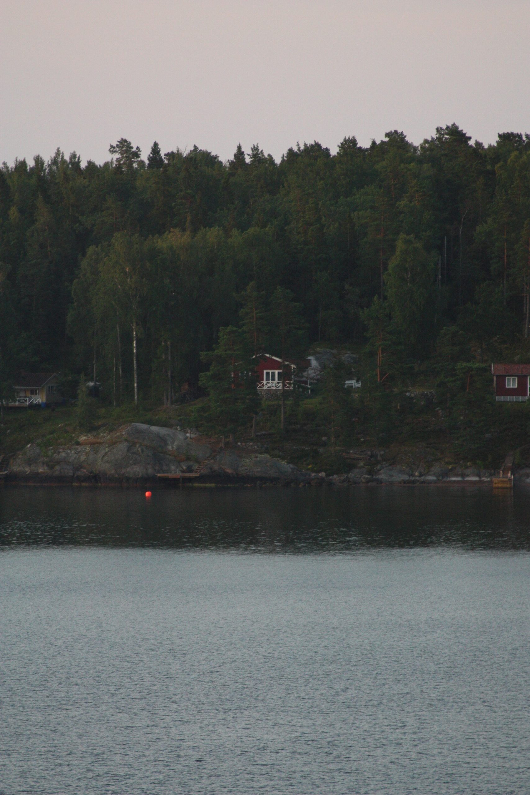 Archipelago shoreline on the cruise ship approach to Stockholm at sunrise