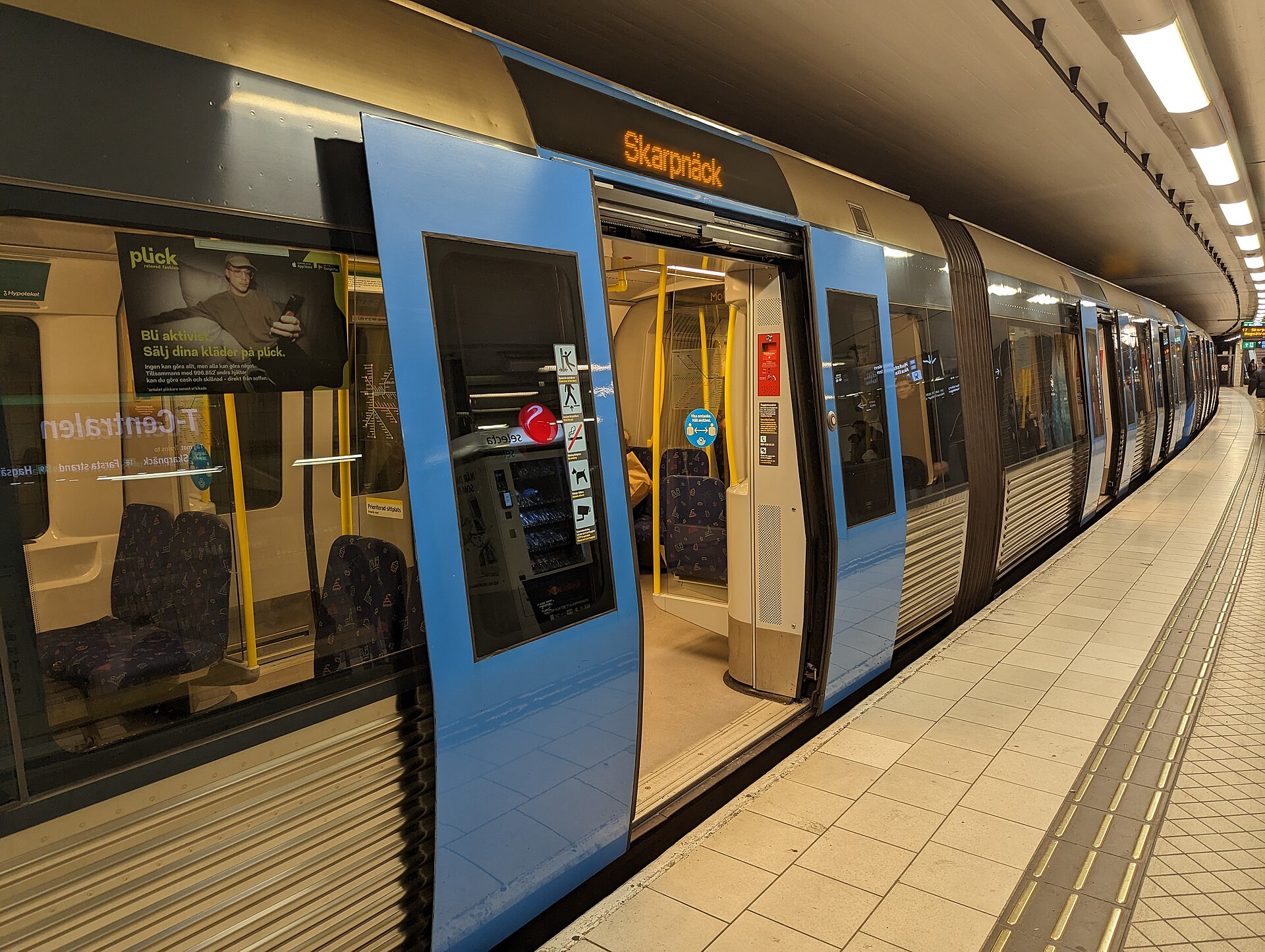 A C20 tunnelbana train bound for Skarpnäck at T-Centralen station in Stockholm